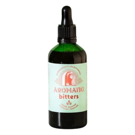 Bottle of Aromatic Bitters with a green label on a white background